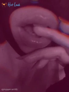 7695973
