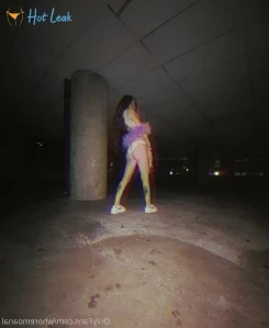 6972673