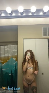 6972764