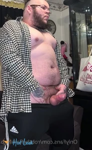 6971988