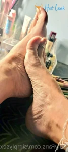6928133