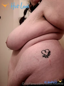 11696973